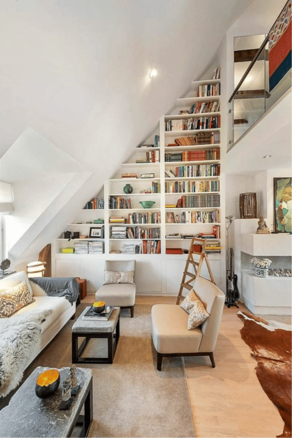 Shelves built in to take advantage of sloping loft roof